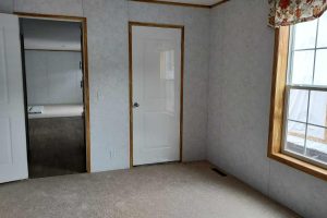 A carpet room within a demo home