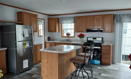 Model 24806 kitchen with appliances, cabinets, island and plenty of counter space